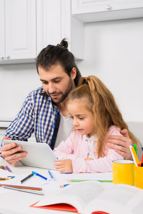 hereth insurance consulting - children education insurance - TFather Helping Daughter Learn