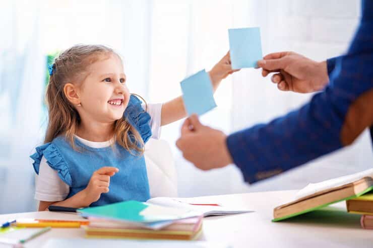 hereth insurance consulting - children education insurance - Teacher Engaging Young Girl